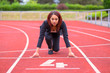 Conceptual image of a woman on a race track