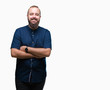 © Krakenimages.com - Young caucasian hipster man over isolated background happy face smiling with crossed arms looking at the camera. Positive person.