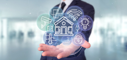 Poster - Businessman holding Smart home interface with icon, stats and data 3d rendering