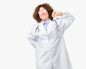 Poster - Middle ager senior doctor woman over isolated background stretching back, tired and relaxed, sleepy and yawning for early morning