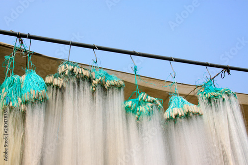Fotografía suspension of fishing nets in the market