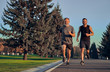 © realstock1 - The happy old and young sportsmen running on the road