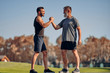 © realstock1 - The young and old athletes greeting in the beautiful park