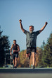 © realstock1 - The two athletes running marathon in the beautiful park