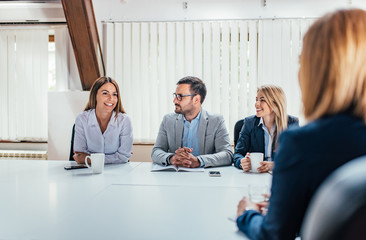 Wall Mural - Business people talking at meeting room.