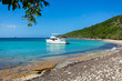 © PhotoSpirit - Private boat at seashore carribean vacation getaway