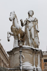 Wall Mural - Castor statue under snow in Rome, Italy