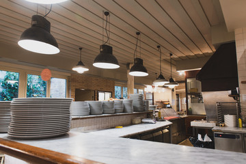 Restaurant interior wide shot pizza worktop