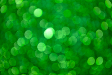 Wall Mural - Abstract Green Glister bokeh Background Christmas lights ,Abstract Blurred Bokeh Holiday festive background made with new year backdrop