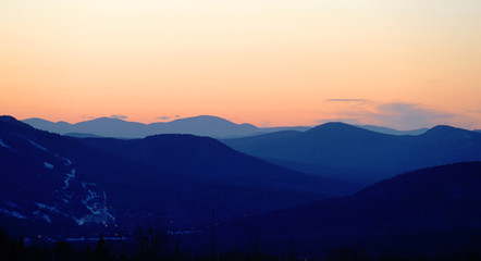 Wall Mural - landscape of mountain range under dusk sunlight