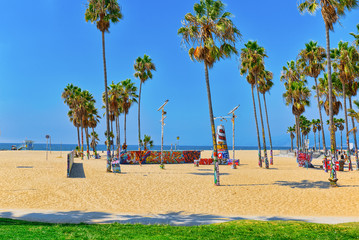 Famous Los Angeles Beach - Venice Beach with people.