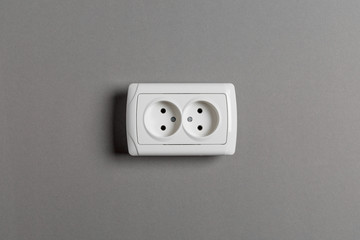 socket on gray wall