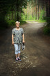 © Nadia - Young woman walking in forest