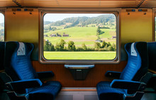 Swiss Rural Farmland Through Train Window, Train Travel Concept.