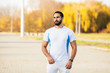 © Maksymiv Iurii - Fitness. Stretch man doing stretching exercise. Standing forward bend stretches of legs