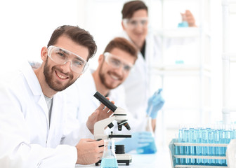 Wall Mural - closeup.a group of scientists in the workplace.