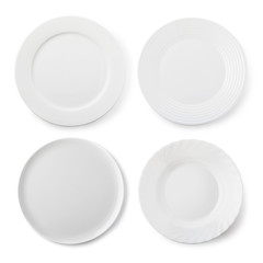 Wall Mural - Set of empty white ceramic plates, top view of isolated objects