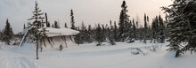 Cree Hunter's Tent In The Quebec North In The Winter Boreal Forest, Panorama.
