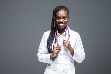 Wall Mural - Young Afro american doctor woman isolated on white background