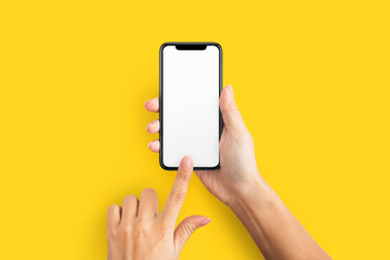 mockup of female hand holding cell phone with blank screen