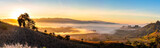 Fototapeta Sawanna - Mountain and foggy at morning time with orange sky, beautiful landscape in the thailand