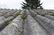 Grey dangerous asbestos roof texture background.