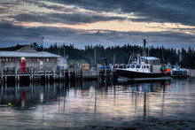 Lobster Boats Moored At Lobster Pound Preparing For Day