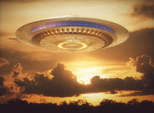 Unidentified Flying Object, UFO With The Sunset In The Background. Clipping Path Included.