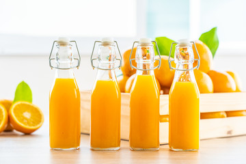 Wall Mural - Fresh orange juice for drink in bottle glass