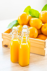 Canvas Print - Fresh orange juice for drink in bottle glass