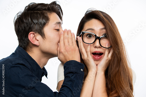 耳打ちする男性に驚く女性 Stock Photo Adobe Stock 耳打ちする男性に驚く女性 Stock Photo Adobe Stock
