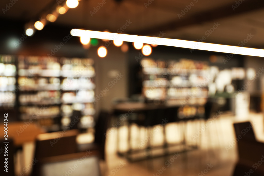 Blurred interior of modern cafe