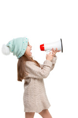 Little cute kid baby girl holding in hand and speaking in electronic gray megaphone isolated on white background. Kids childhood lifestyle concept. Copy space