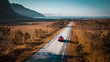 © SmallWorldProduction - Road Trip with a small red car on a long road