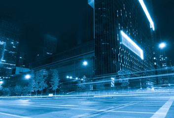 Poster - abstract image of blur motion of cars on the city road at night，Modern urban architecture in hangzhou, China