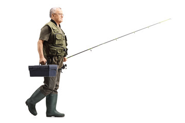 Poster - Mature fisherman walking with a fishing rod and a box