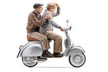 Two Senior Men Riding A Vintage Scooter Fast