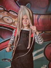 Boy with knives and octopus on head