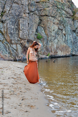 Young Beautiful Naked Amazon Woman On The Sand River Beach Photo Stock Adobe Stock