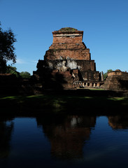 Wall Mural - Sukhothai historical park the old town of Thailand Ancient Buddha Statue at Wat Mahathat in Sukhothai Historical Park,Thailand