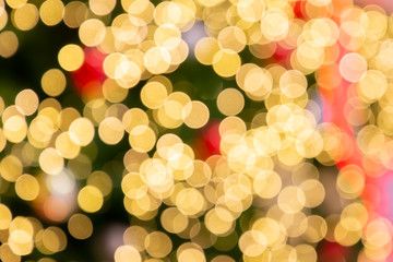 Blurred bokeh light background, Christmas and New Year holidays background. Colorful beautiful blurred bokeh background with copy space. Holiday texture. Glitter multicolored light spots.