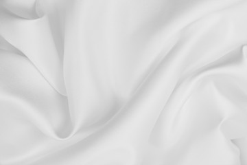smooth elegant white silk or satin luxury cloth texture as wedding background. luxurious background 