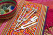 © Charu Bonnet - Hand holding a tuning fork .