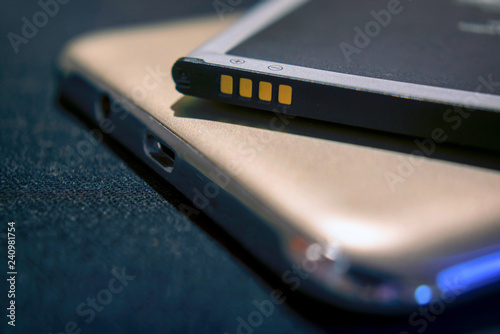 Fotografía Connecting Positive and Negative Terminals on a Rechargeable Lithium Mobile Battery
