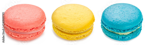 Fotografía Several colorful macarons isolated on white background.