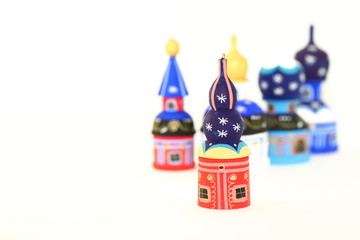 Wall Mural - Shallow focus Set of wood painted cupola tower toy, orthodox towers toy, mausoleum toy, souvenir russian style isolated on white background.