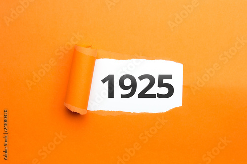 Fotografia surprising Number / Year 1925 orange background