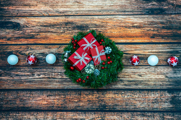 Wall Mural - Christmas background with Christmas decorations on the dark wooden