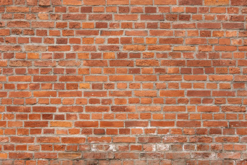 Old Red And Brown Texture Of A Brick Wall. Surface Of The Old Red-brick Building. Wall With Cracked Structure Grunge Background.