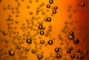 Wall Mural - Water Drops On Orange Background Texture Cola colorful waterdrop